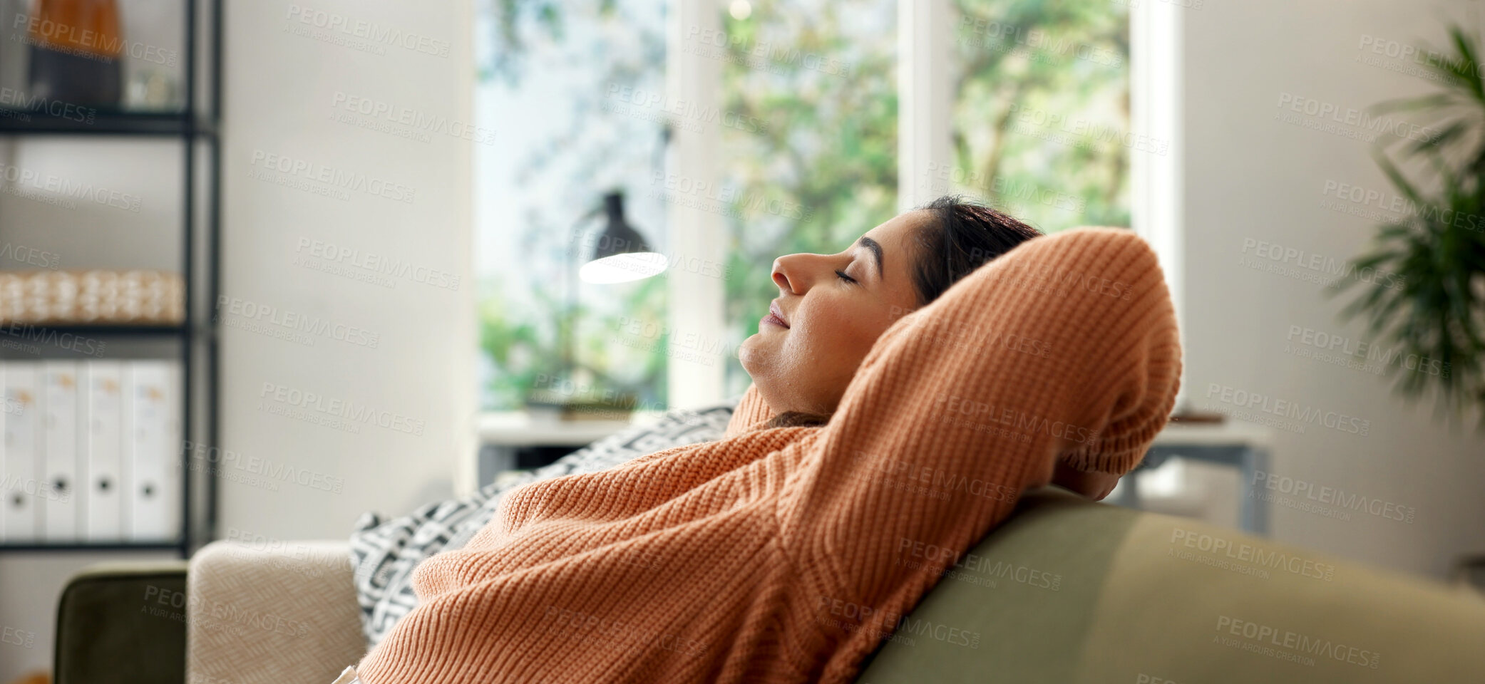 Buy stock photo Stretching, smile and peace with woman on sofa of home for calm, self care and weekend break. Eyes closed, pride or mindfulness with female person in living room in apartment for comfortable and rest