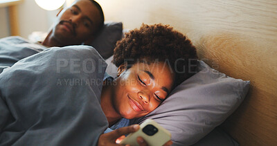 Buy stock photo Phone, couple and woman in bedroom with addiction, jealous man and browsing social media. Ignore, mobile and African people in bed at home with attention problem, relationship neglect or text message
