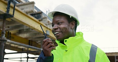 Buy stock photo Construction, man and happy with radio on site for building inspection, labor pacing and workflow. Project manager, black person or communication outdoor for task coordination, compliance or feedback
