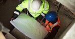 Above, floorplan and engineer team on construction site for planning, renovation design or meeting. People, blueprint and contractors at worksite for urban development with infrastructure maintenance