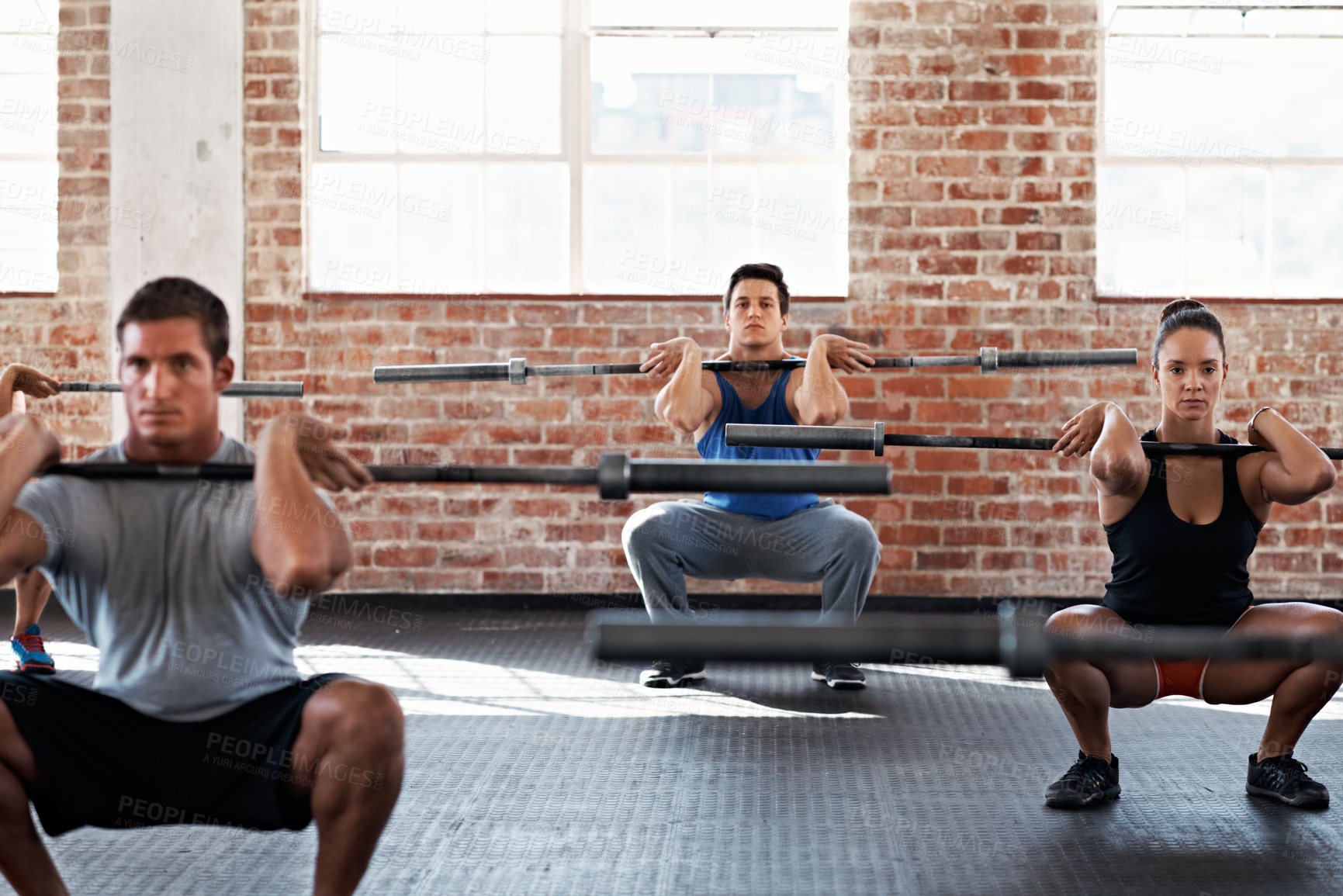 Buy stock photo Athlete, training and group with barbell in gym, endurance or workout routine for muscle development. Health club, balance and people with equipment for wellness, fitness and bodybuilding exercise
