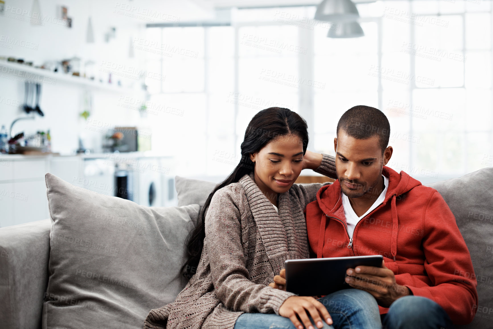 Buy stock photo Relax, tablet and couple in home for bonding, watching movie or entertainment together on weekend. Technology, man and woman on sofa to chill, streaming show and video with partner on internet
