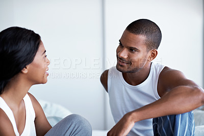 Buy stock photo Cropped shot of a young couple enjoying their morning at home