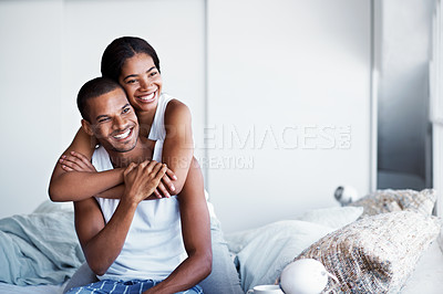 Buy stock photo Cropped shot of a young couple enjoying their morning at home