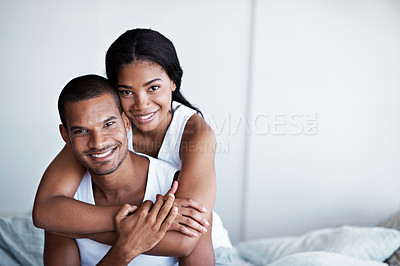 Buy stock photo Cropped shot of a young couple enjoying their morning at home