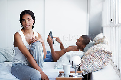 Buy stock photo Cropped shot of a young couple enjoying their morning at home