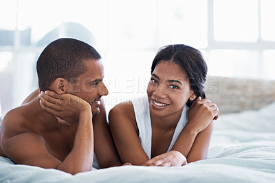 Buy stock photo Cropped shot of a young couple enjoying their morning at home