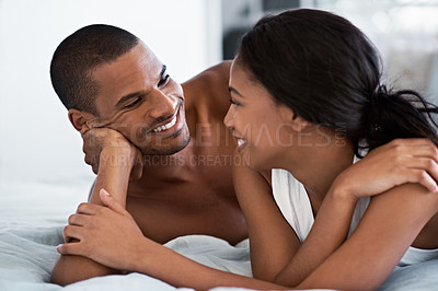 Buy stock photo Cropped shot of a young couple enjoying their morning at home