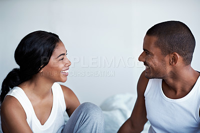 Buy stock photo Cropped shot of a young couple enjoying their morning at home