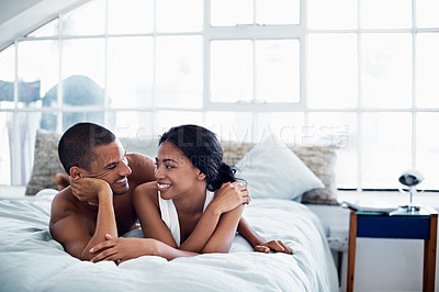 Buy stock photo Cropped shot of a young couple enjoying their morning at home
