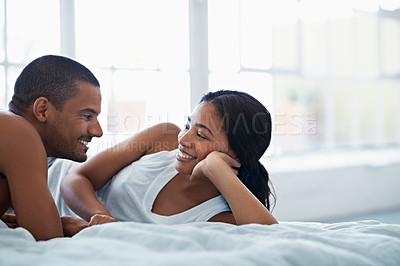 Buy stock photo Cropped shot of a young couple enjoying their morning at home