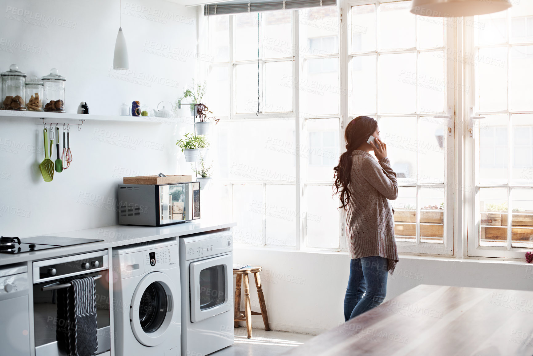 Buy stock photo Phone call, back and woman in kitchen with contact, networking and communication in online chat. Internet, gossip and person in house with tech, conversation and connection with digital discussion.