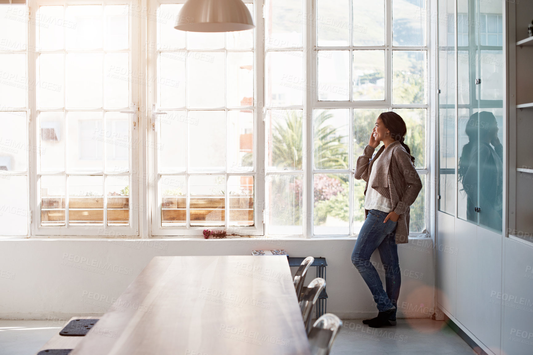 Buy stock photo Smile, phone call or woman at office for creative advice with fashion magazine editor by window. Mobile, happy person or talk at work for publication, space or business communication for style review