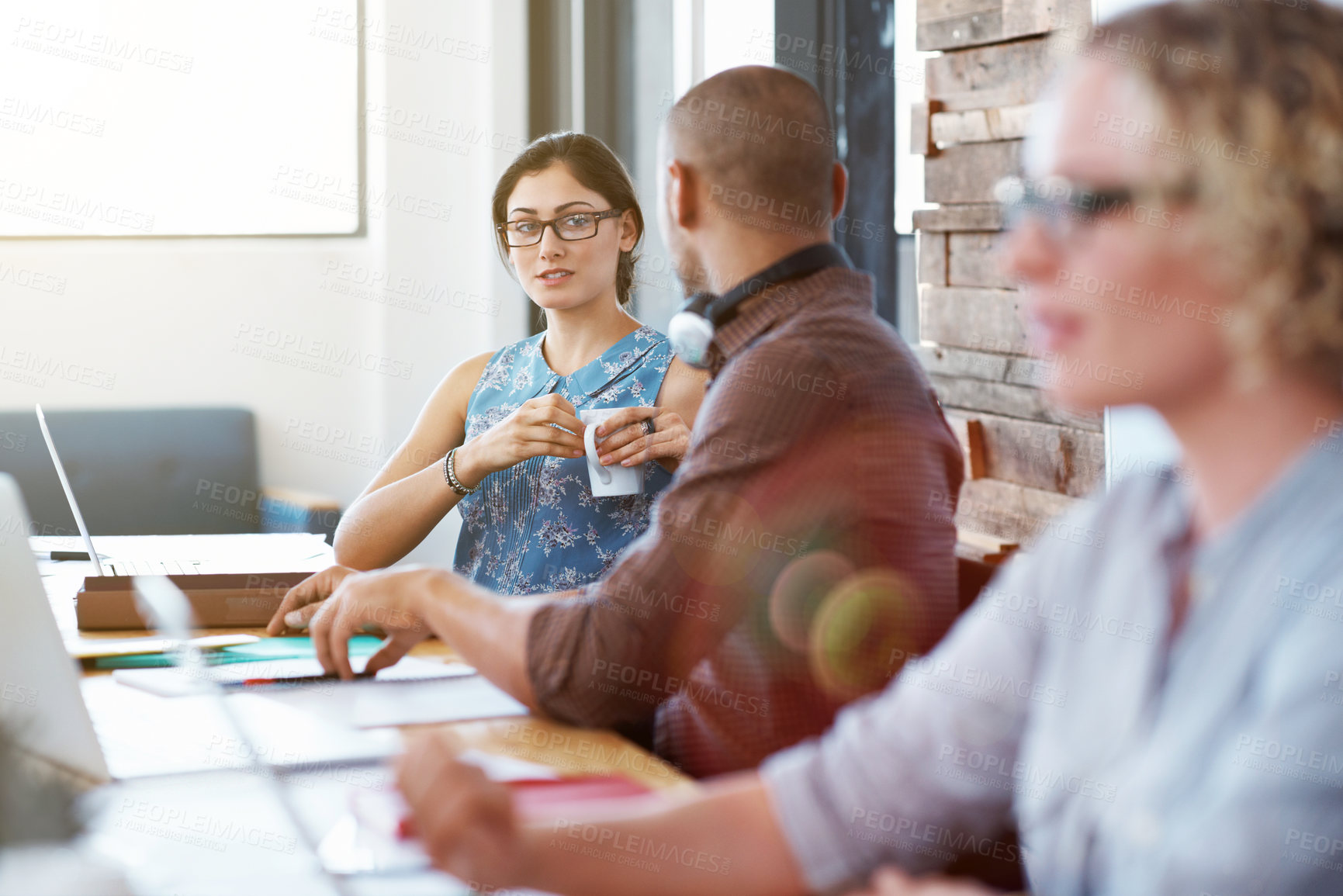 Buy stock photo Creative, discussion or team in office with project, campaign pitch or review on brand strategy. Coworking, people or marketing staff with collaboration, growth plan or feedback on business identity.