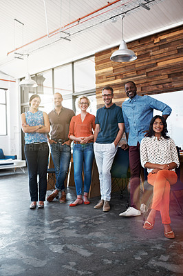 Buy stock photo Portrait of a diverse group of coworkers standing together in an office