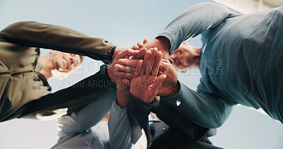 Buy stock photo Blue sky, people and hands with huddle for fitness, support and health celebration together. Nature, teamwork and friends with stack for solidarity, exercise goal or motivation with low angle