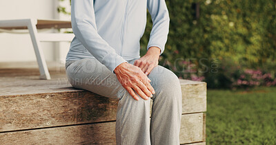 Buy stock photo Knee pain, hands and backyard with old woman in home for osteoarthritis, injury or joint issue. Fibromyalgia inflammation, fracture risk and pressure with senior person outdoor for tension and sprain