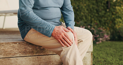 Buy stock photo Knee pain, hands and backyard with old man in home for osteoarthritis, injury and joint issue. Fibromyalgia inflammation, fracture risk and pressure with senior person outdoor for tension and sprain