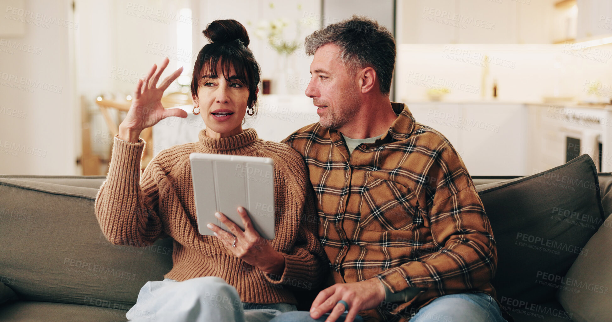 Buy stock photo Talking, sofa and mature couple on tablet for planning, online shopping and decision for purchase. Marriage, home and man with woman on digital tech for connection, internet and bonding on weekend