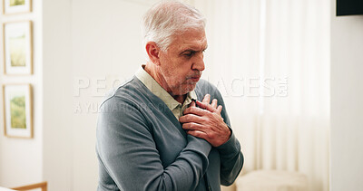 Buy stock photo Senior, man and home with chest pain for cardiac arrest, respiratory infection or disease. Elderly, male person or patient breathing with heart ache, chronic stress or high blood pressure in house