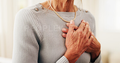 Buy stock photo Senior, woman and hands with chest pain in home for cardiac arrest, respiratory infection or disease. Elderly, female person or patient with heart ache, chronic stress or high blood pressure in house