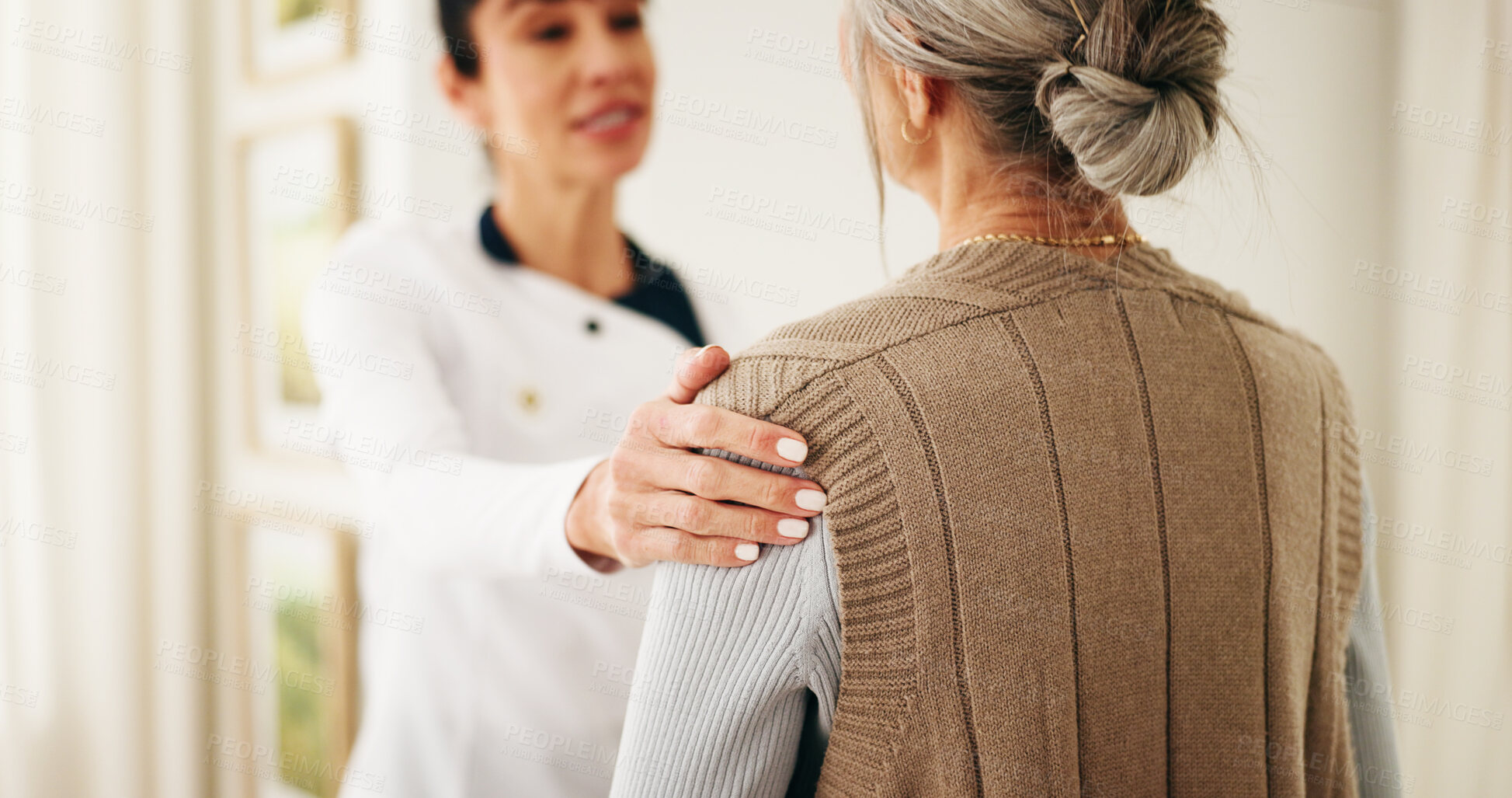 Buy stock photo Caregiver, comfort and talk in nursing home with old woman, medical diagnosis and advice for wellness. Nurse, senior person and help in retirement center with healthcare, support and console patient.