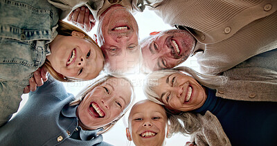 Buy stock photo Below, portrait and big family in circle outdoor with bonding, love and connection on holiday. Happy, care and children with parents and grandparents in huddle for support and safety on vacation.