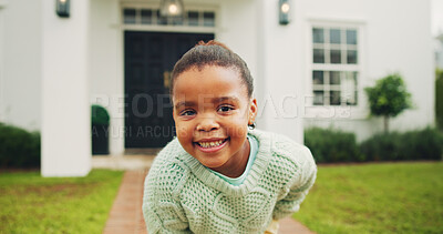 Buy stock photo Happy, portrait and girl in front yard with smile for holiday, break and positivity in neighborhood. Home, childhood and African child with pride, good mood and playful with fresh air outdoor