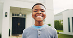 Happy, portrait and child in front yard with smile for holiday, break and positivity in neighborhood. Family home, childhood and African boy with pride, good mood and confident with fresh air outdoor