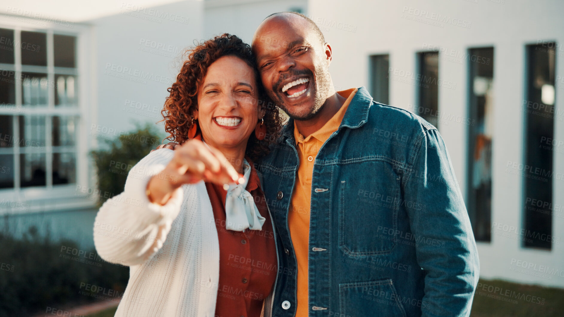 Buy stock photo Smile, portrait and couple with keys to new home, laugh and support with property investment. African man, woman and keychain for real estate goal, dream house and love with mature partner outdoor