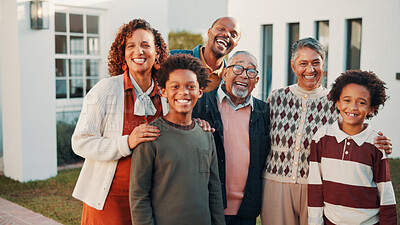Buy stock photo New home, portrait and smile of big family in front yard together for investment or purchase. Boy children, grandparents and parents in garden of apartment for mortgage approval of dream house