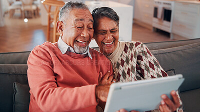 Buy stock photo Senior couple, laughing and relax with tablet in lounge, online and streaming film with subscription. Retirement, home and happy people with tech for funny movies, bonding and watching series on sofa