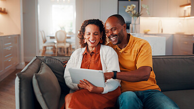 Buy stock photo Couple, online and laughing with tablet in lounge, love or streaming film with subscription in house. Entertainment, home and mature African people with tech for funny movie, rest and bonding on sofa