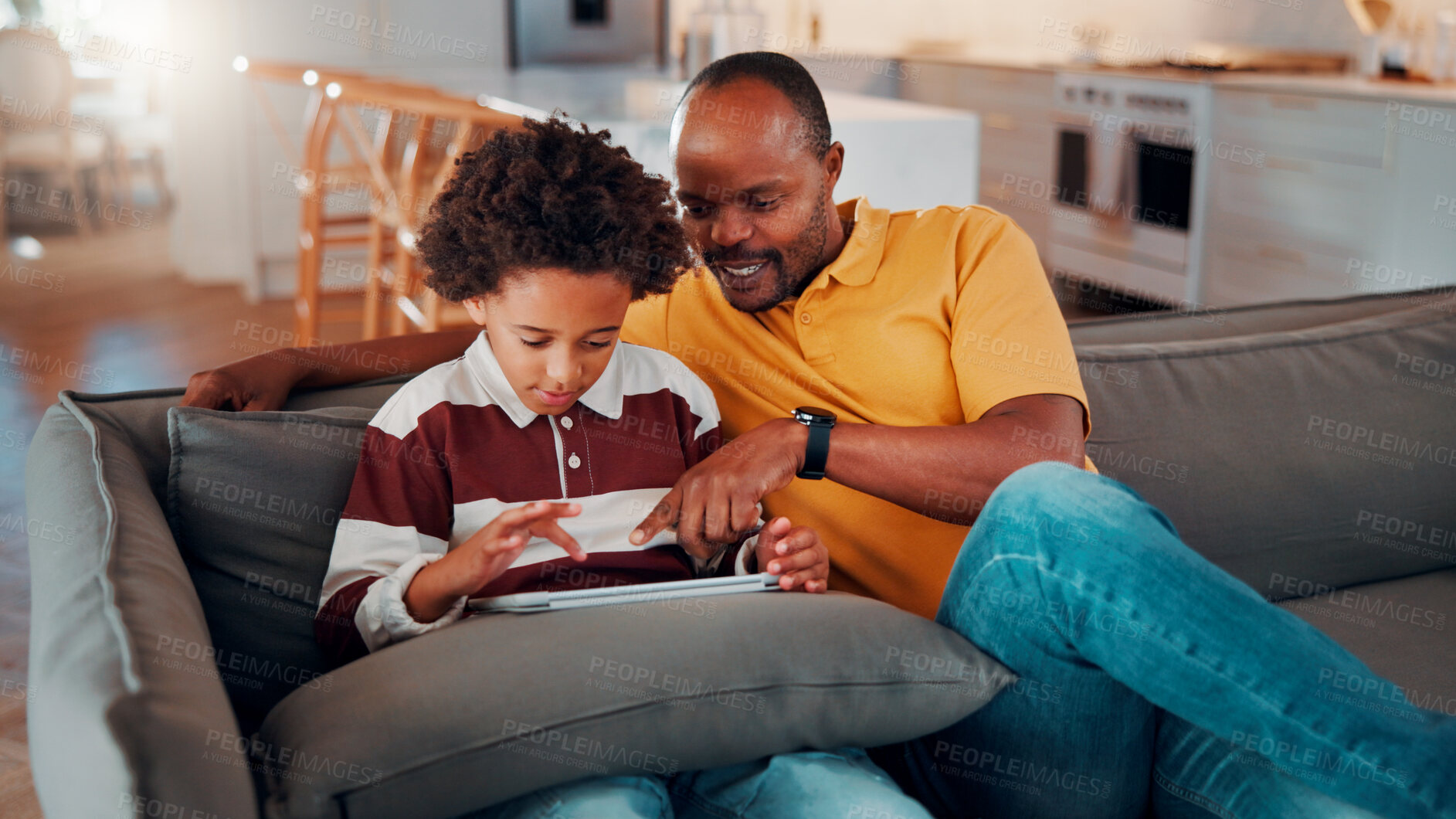 Buy stock photo Father, child and talk in home with tablet, family bonding or teaching son how to play education game. Black people, dad and kid in living room with tech, online gaming and conversation for learning.