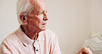 Thinking, planning and senior man in bedroom at house for reflection, remember or retirement memory. Relax, nostalgia and elderly person with dementia on bed with ideas for pension funds in home.