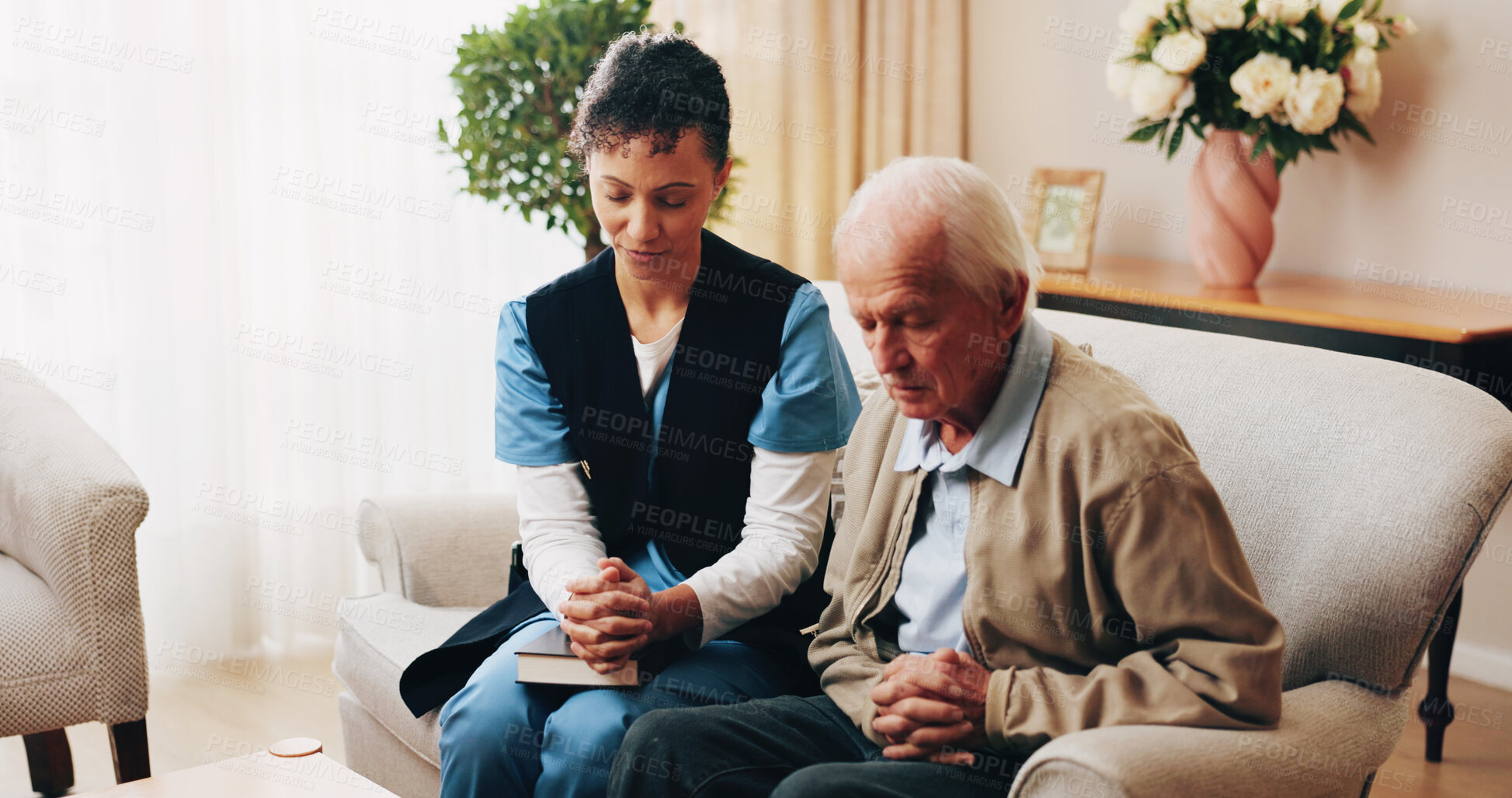Buy stock photo Nurse, praying and senior man with bible in home for faith, religion or christianity. Woman, healthcare worker or caregiver with holy book for elderly care, blessing or spiritual healing in house