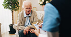 Nurse, writing and senior man with consultation for chronic illness, health checkup or diagnosis. Caregiver, therapist or taking notes with male person for elderly care, exam or healthcare service