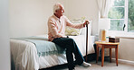 Planning, relax and senior man in bedroom at house for reflection, remember or retirement memory. Walking stick, nostalgia and elderly person with dementia on bed with ideas for pension funds in home