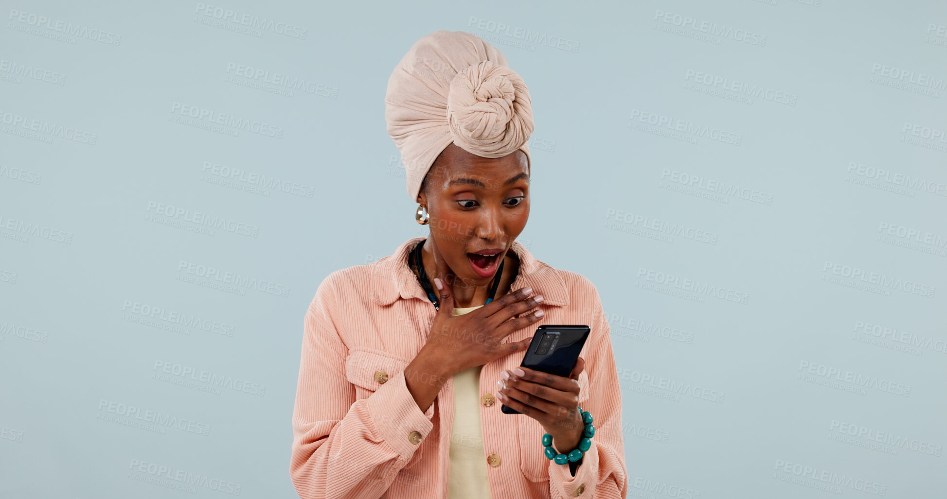 Buy stock photo Studio, surprise and woman with phone, online and reading good news on social media or notification. White background, mockup space and black person with mobile, shocked and announcement on website