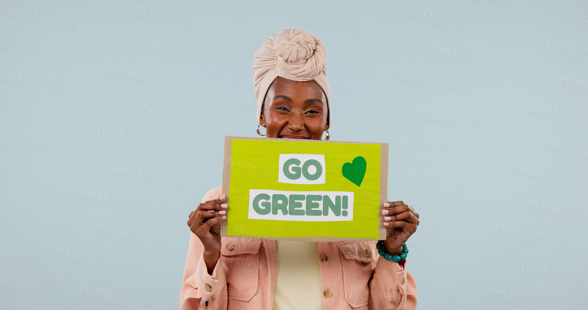 Buy stock photo Poster, portrait and woman in studio for recycling, go green and support for climate change on mockup space. Happy, sign and African person for environmental care, sustainability and blue background