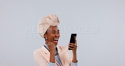 Buy stock photo Studio, celebration and woman with phone, laughing and good news on social media app or notification. White background, success and black person with mobile, mockup space and happy for announcement