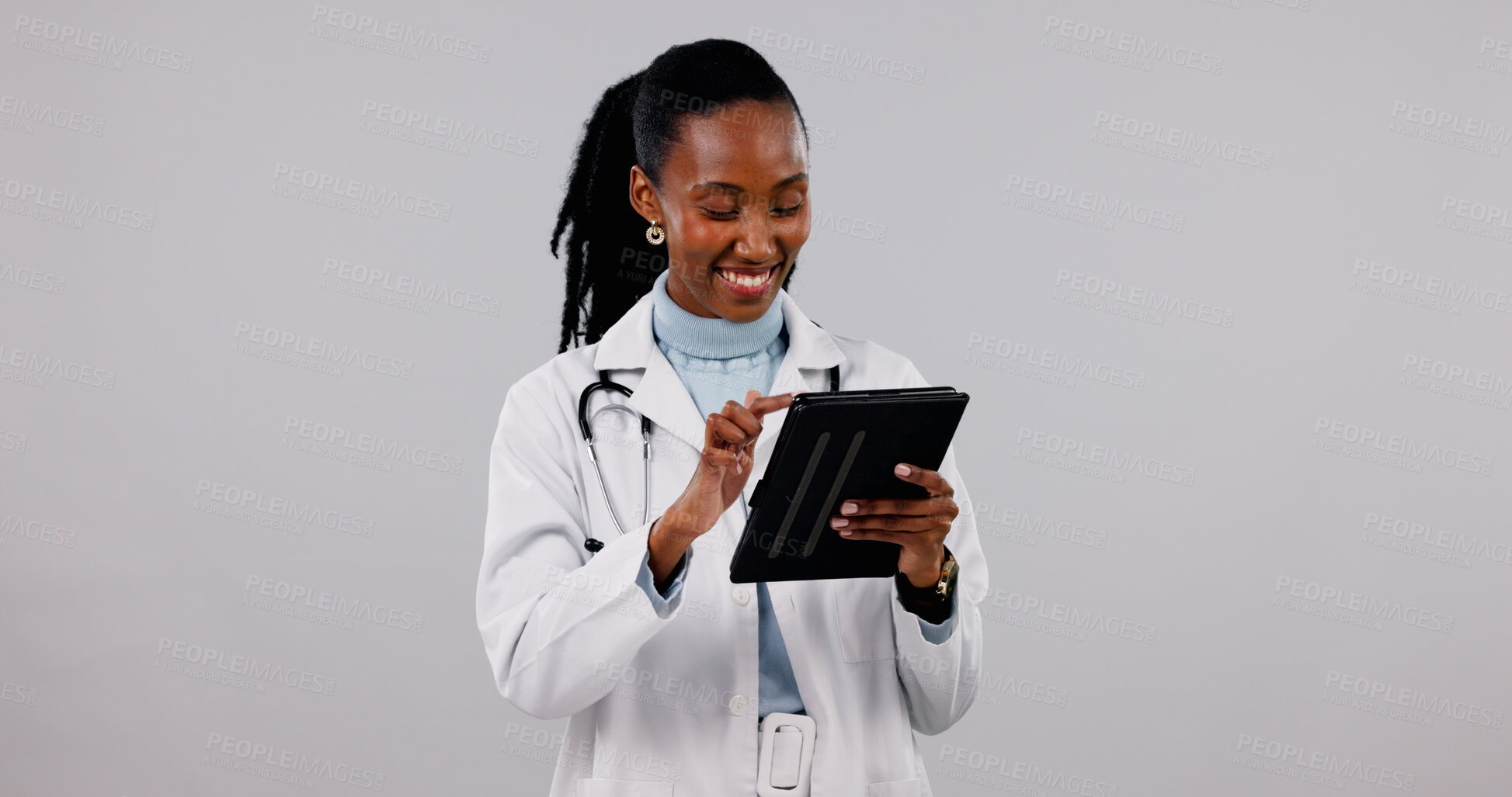 Buy stock photo Black woman, doctor or tablet in studio with network, telehealth app or smile for efficiency. Cardiologist, tech or happy on white background space for research, feedback or online for medical advice