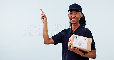 Buy stock photo Pointing, portrait and woman in studio for shipping, delivery and info space for courier service. Mockup, happy and African person with box for ecommerce, logistics or advertising on white background