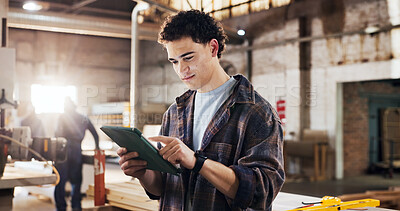 Buy stock photo Tablet, carpenter and man in workshop for planning, online order and inventory report for furniture project. Carpentry, factory and person on tech for woodworking, production and timber business