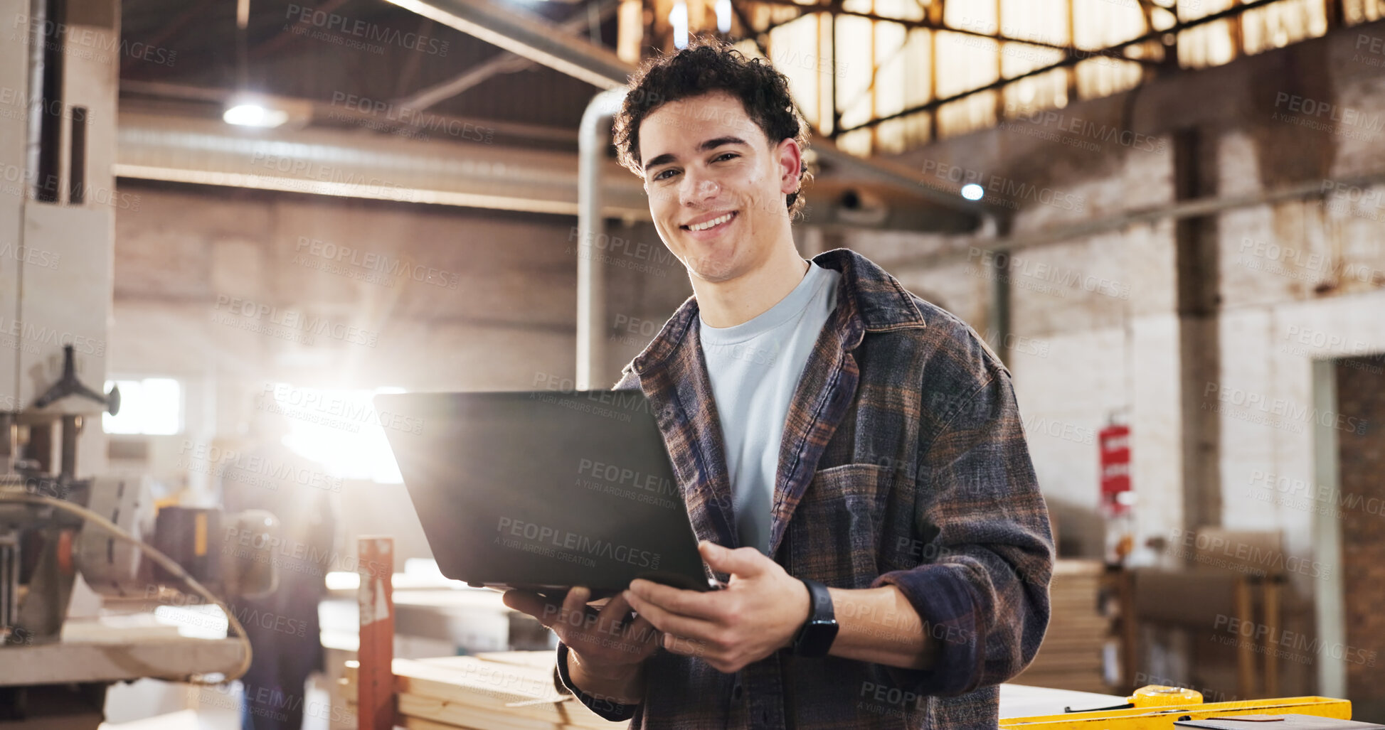 Buy stock photo Laptop, man and portrait of carpenter in workshop with confidence for furniture manufacturing. Happy, industry artisan and woodworker with computer for timber production with research in factory.