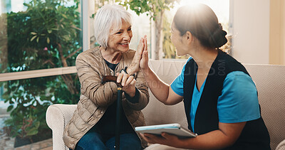 Buy stock photo Nurse, high five and senior woman with support in house, wellness or tablet for medical healthcare. Smile, caregiver or person with cane, retirement or tech for checkup success in homecare with flare