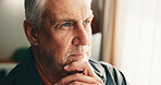 Thinking, decision and senior man by window in home with memory, remember or planning retirement. Relax, pension and elderly person in living room with choice, reflection or nostalgia in house.
