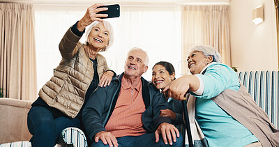 Buy stock photo Caregiver, home and selfie with people in retirement, smile and capture moment for social media. Happy carer, senior friends and picture in living room with laugh, photography and memory in homecare
