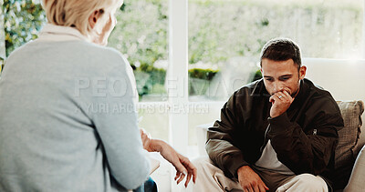 Buy stock photo Psychology, therapist and man in consultation, thinking or stress for mental health evaluation. Counseling session, patient and person with thoughts for ptsd, anxiety assessment and help in office