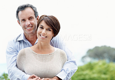 Buy stock photo Smile, hug and couple with love outdoor, loyalty and relationship commitment on vacation. Happy, mature man and woman embrace in nature for care, trust and space on holiday with portrait of partner